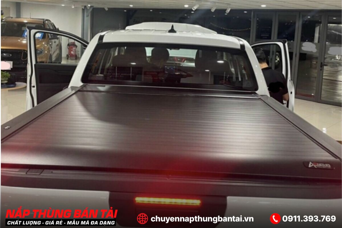 NẮP THÙNG CUỘN ĐIỆN ANPHA NISSAN NAVARA